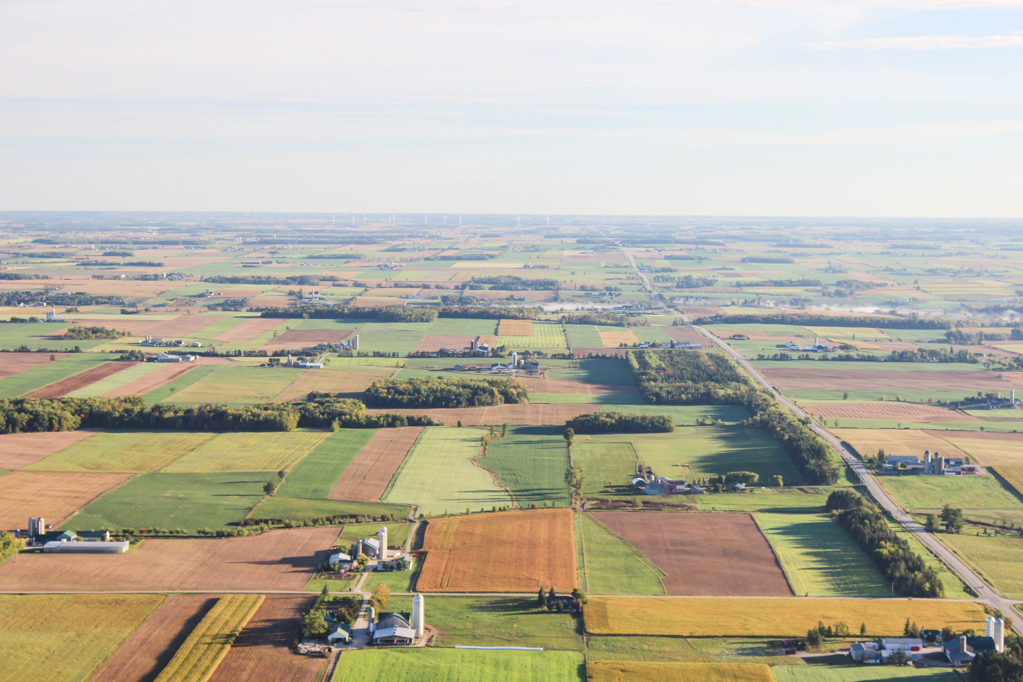 Aerial view of farm fields across the landscape
