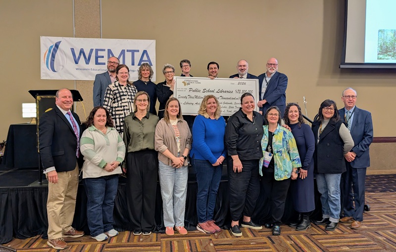 Ceremonial check of $73.5 million dollars presented to WEMTA representatives.