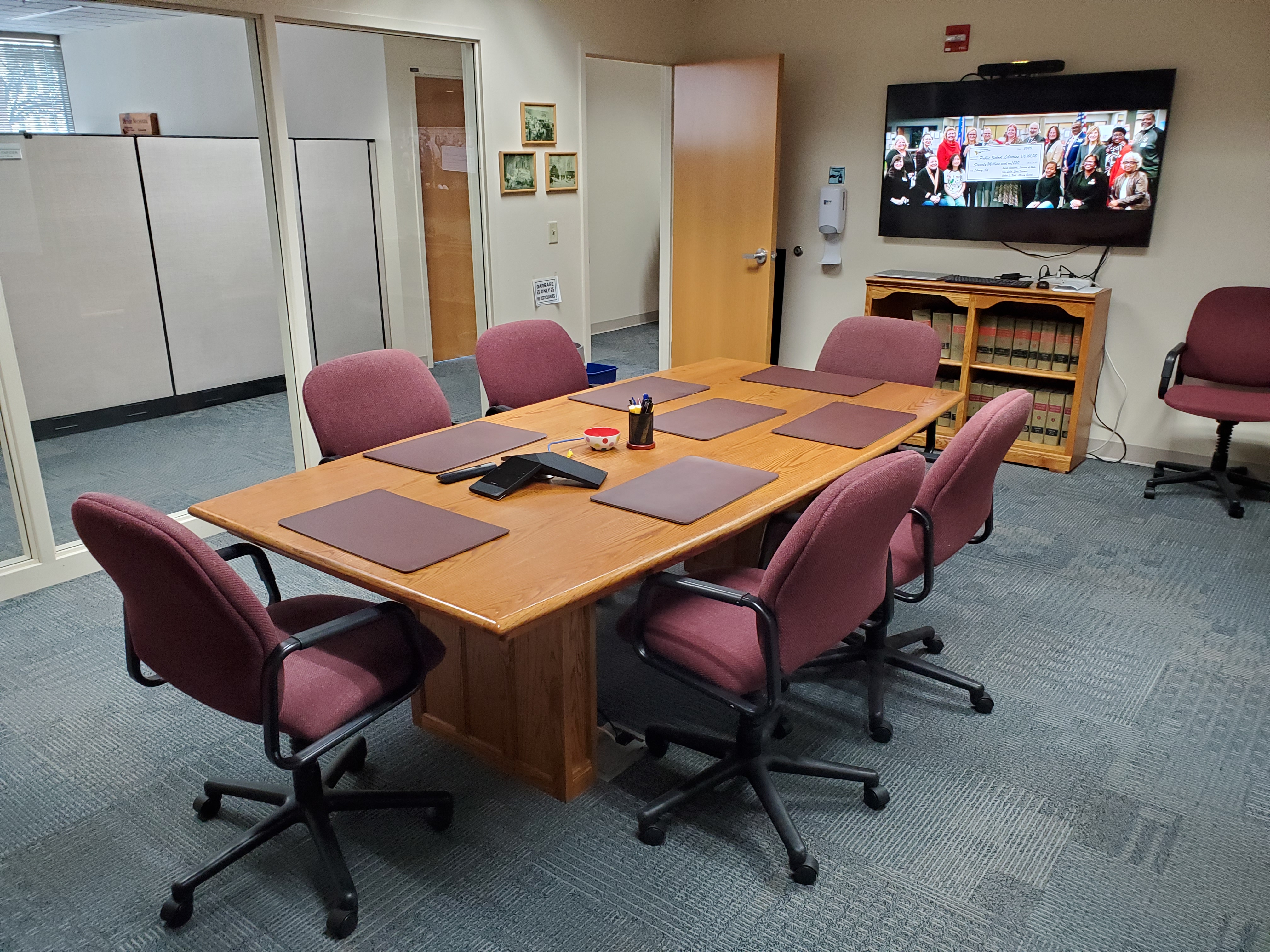Meeting room with conference room table.