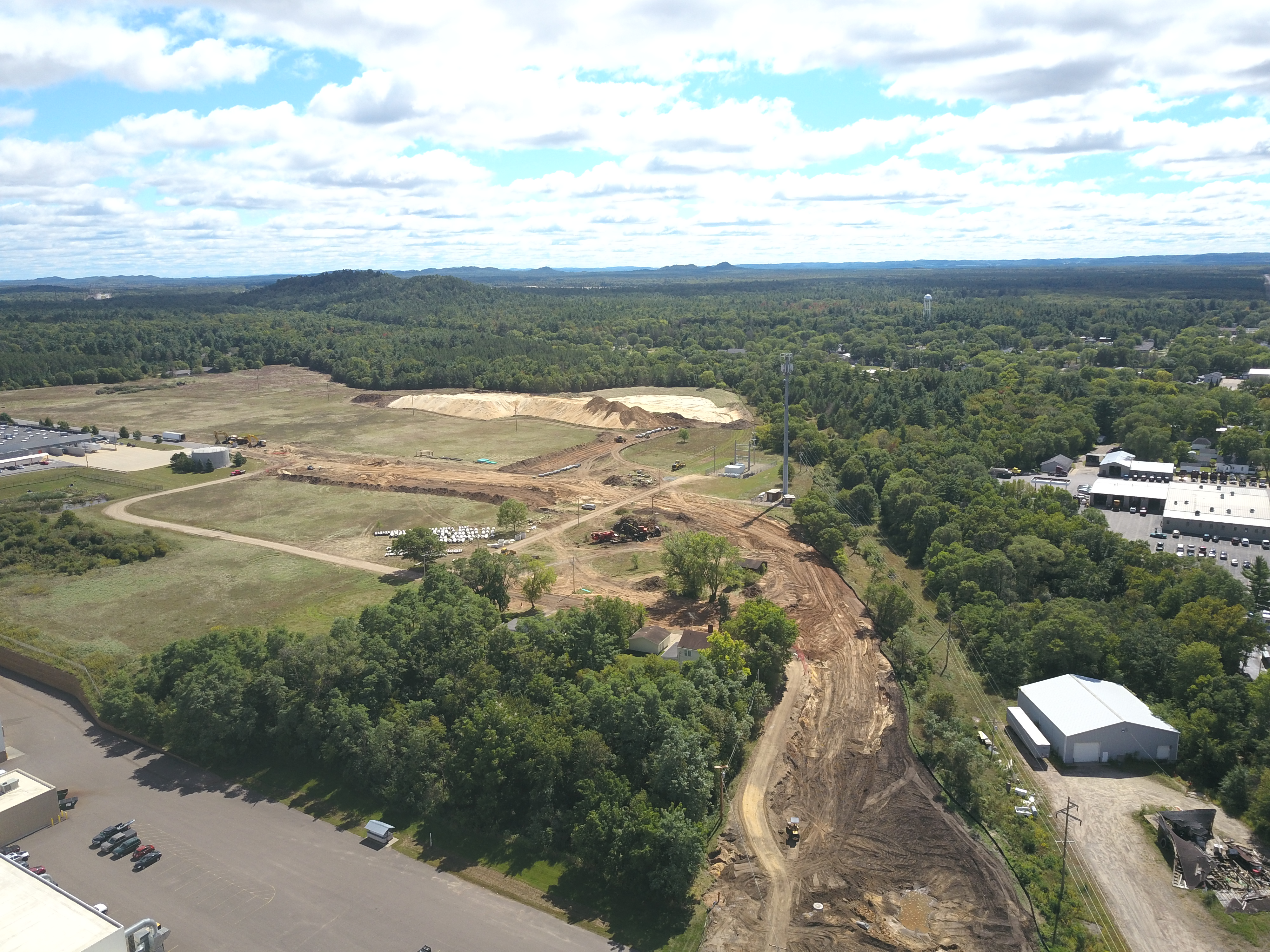 Aerial photo of the City of Black River Falls business park development area construction of second entrance road.