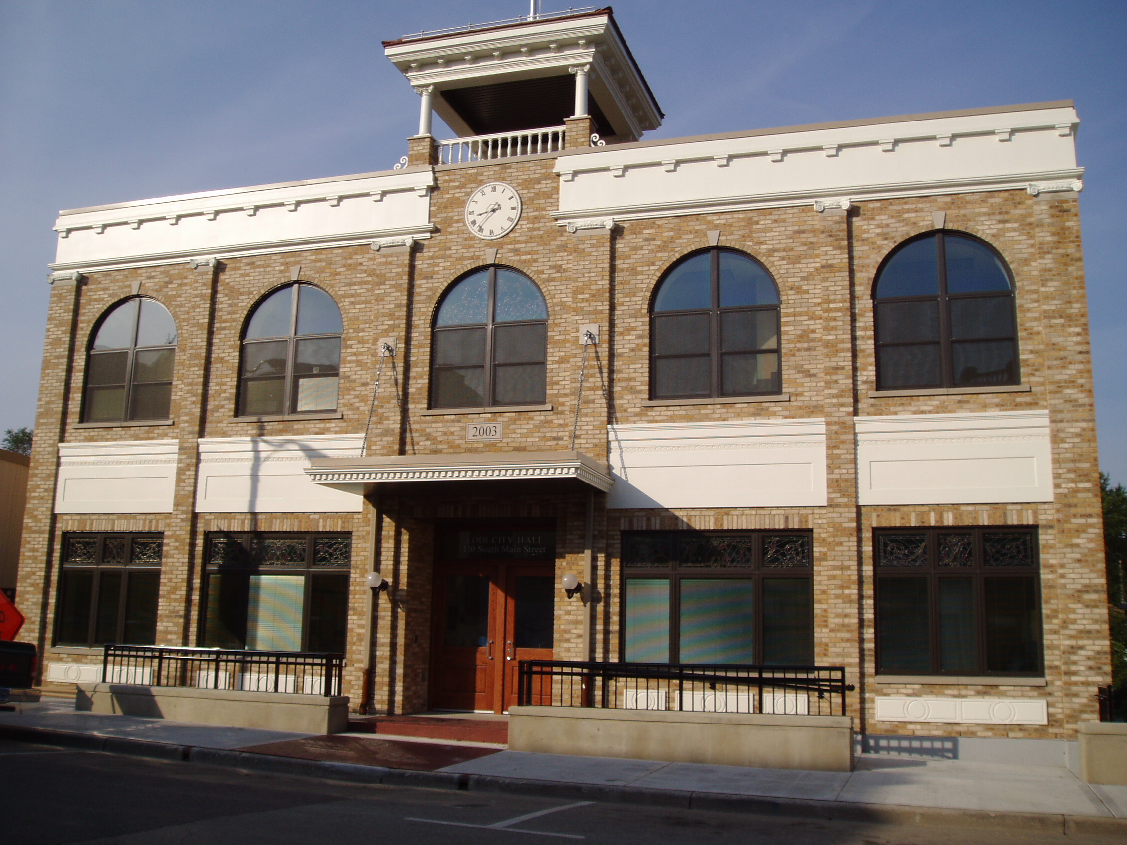 Tan 2 story brick City Hall building in the City of Lodi