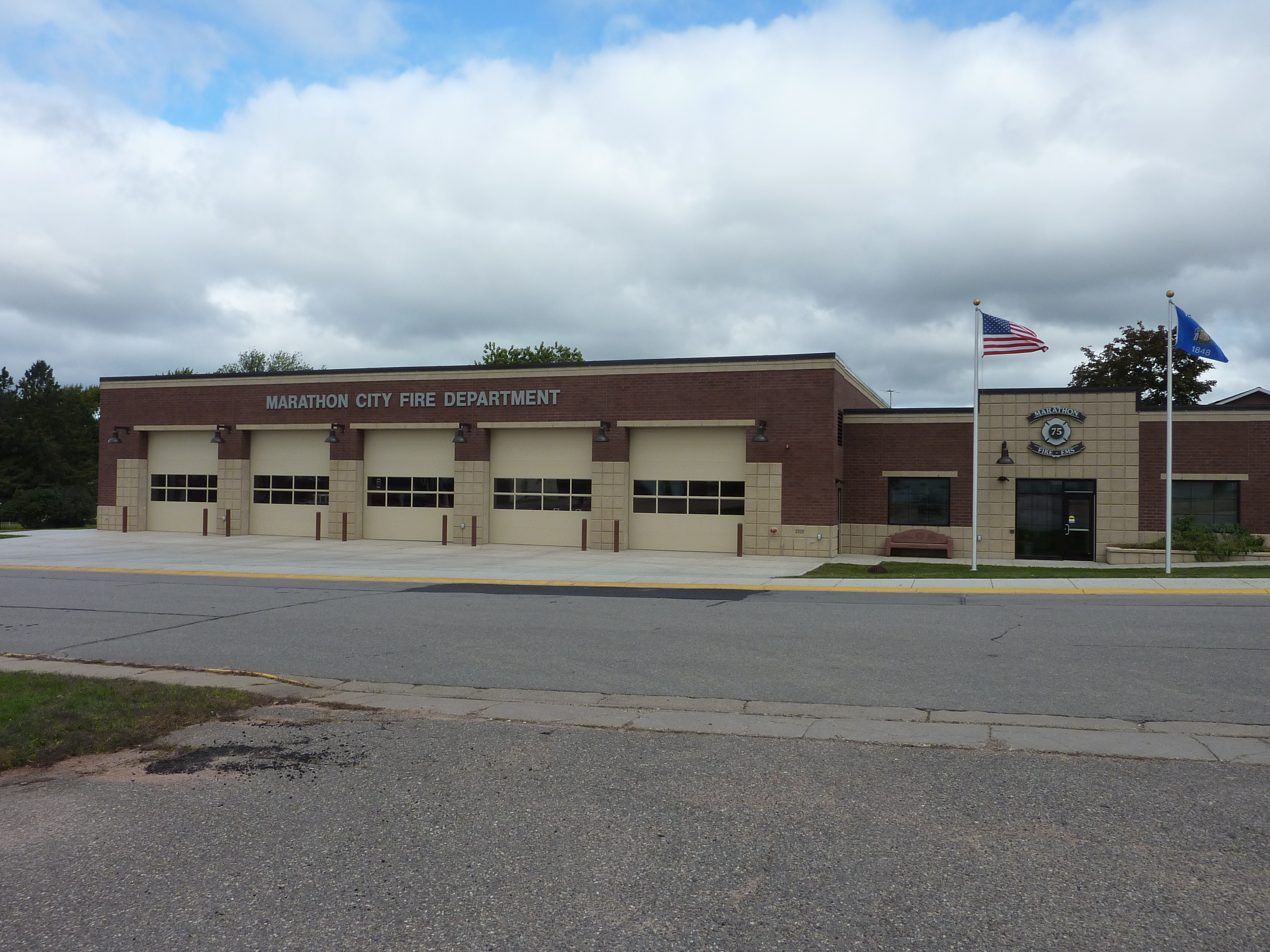 Front view of the red brick Marathon City fire department building