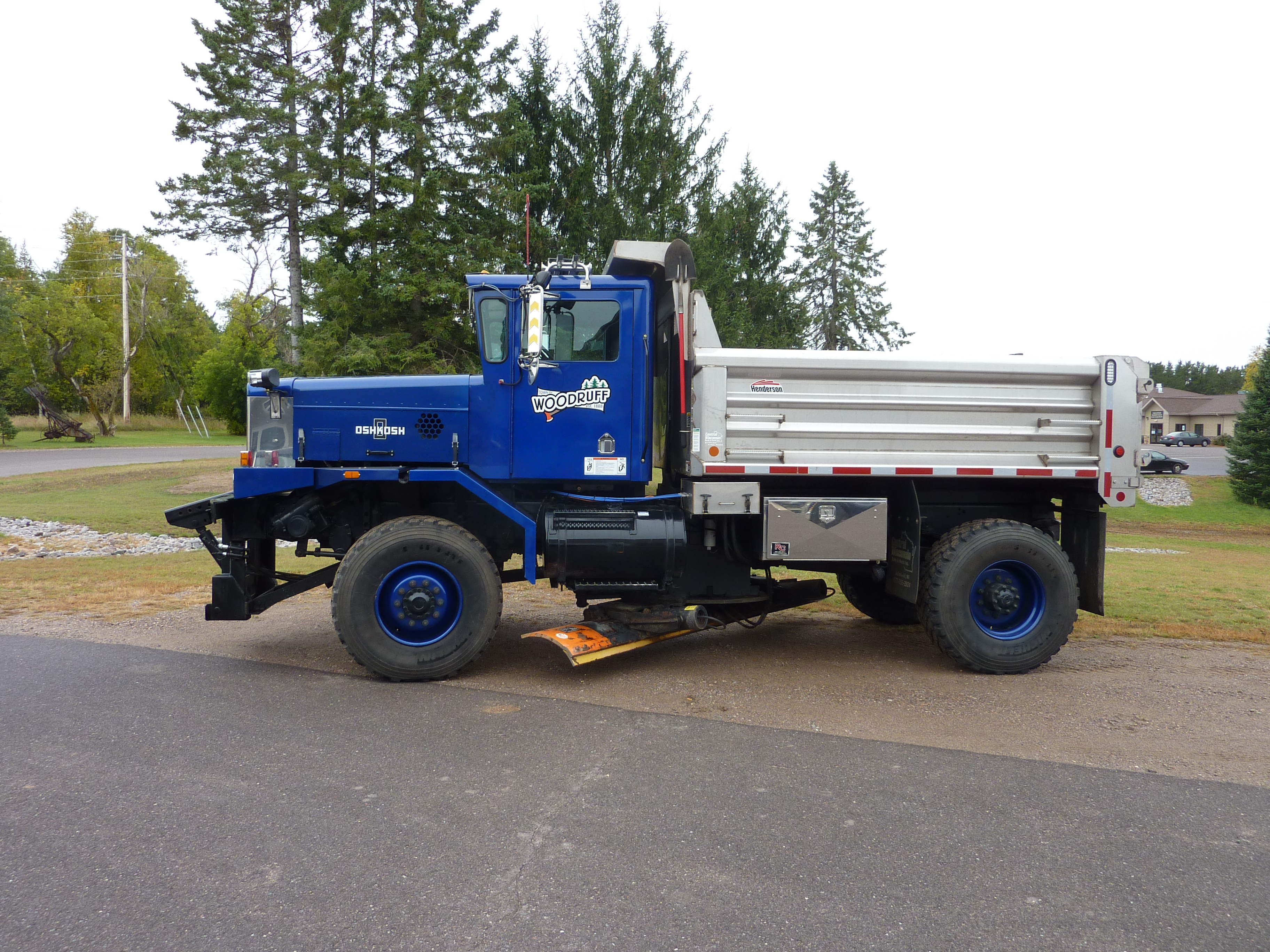 Large blue snow plow truck purchased by the Town of Woodruff